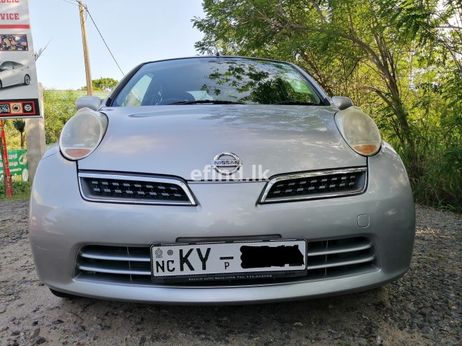 Nissan march K 12 beetle 2014 registered (Mf year 2009)